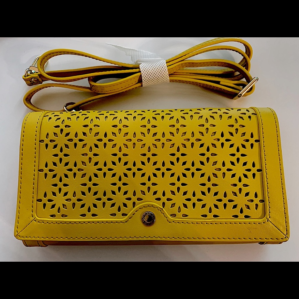 Danier leather yellow purse worn multiple ways!